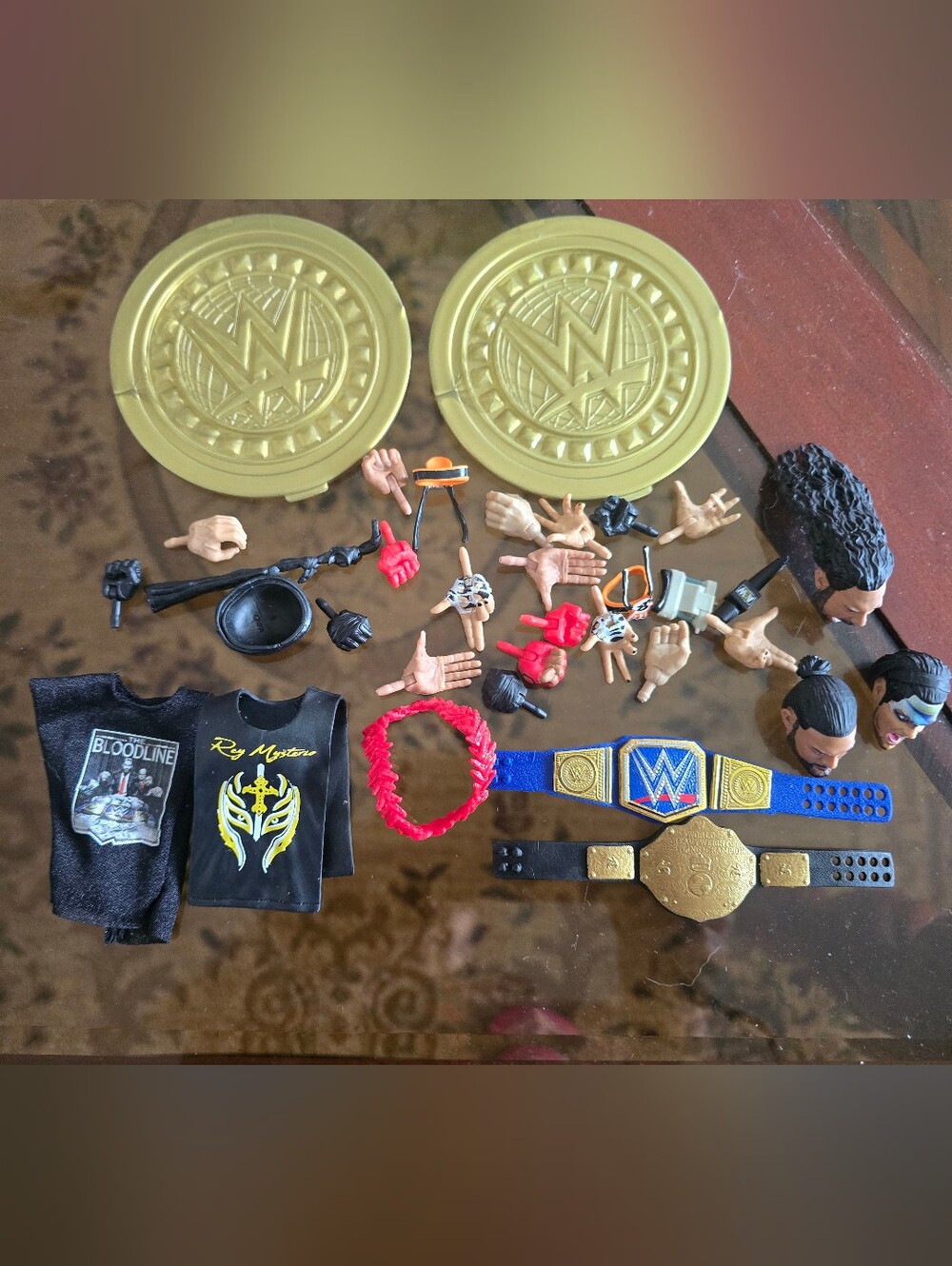 WWE Action Figure Accessories Lot - Championship Belts, Heads, Hands, Shirts & D